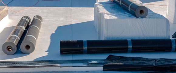 Commercial building with a flat roofing system installed by Life Style Roofing